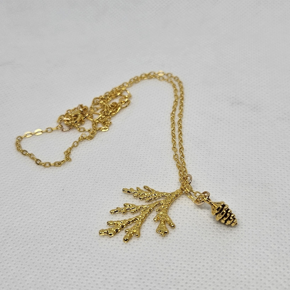 Golden cedar branch and cone necklace